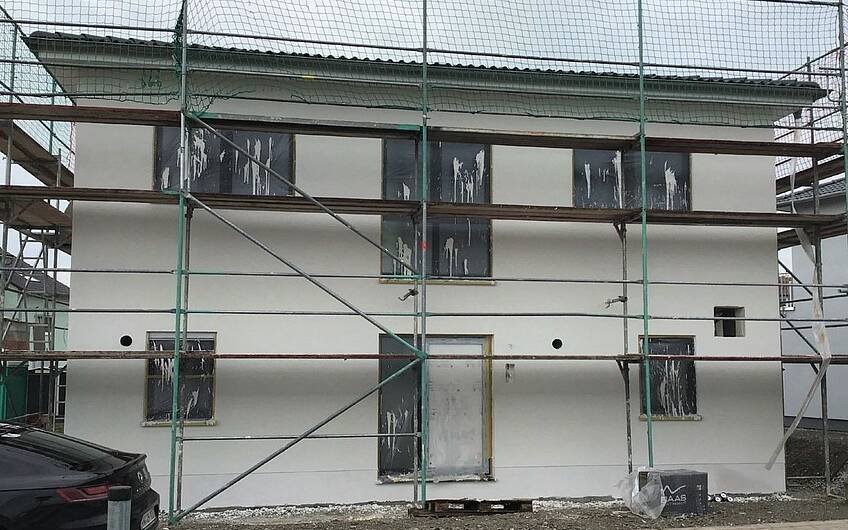 Außenputz am frei geplanten Familienhaus von Kern-Haus in Waghäusel