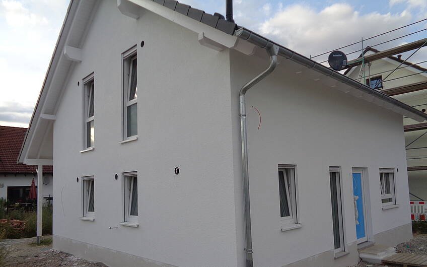 Individuell geplantes Einfamilienhaus Family von Kern-Haus in Römerberg ohne Gerüst