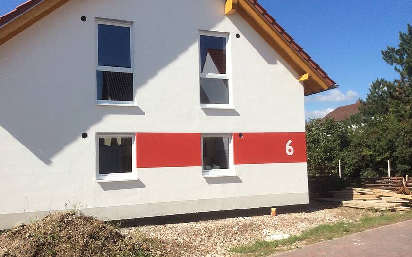 Fertige Fassade des individuell geplanten Einfamilienhauses Signum von Kern-Haus in Hochdorf-Assenheim