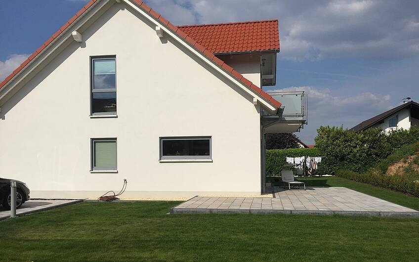 Seitenansicht des individuell geplanten Einfamilienhauses Magnum von Kern-Haus in Dannstadt-Schauernheim