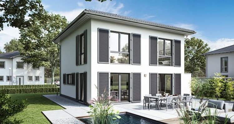 Markanter Bauhausstil mit Flachdach und einer transparenten Architektur.