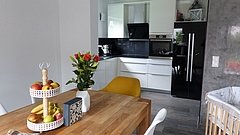 Essbereich des Einfamilienhauses Komfort von Kern-Haus in Neupotz mit offener Küche