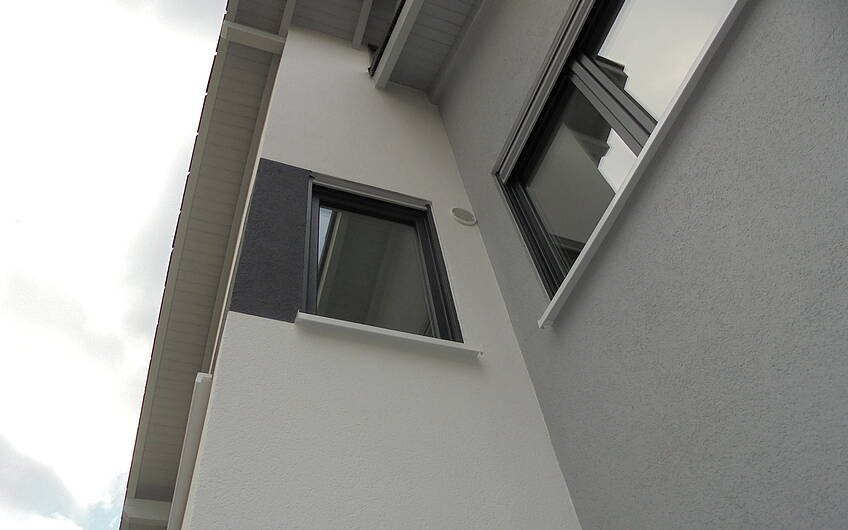 Fassade des individuell geplanten Einfamilienhauses Futura Pult von Kern-Haus in Obrigheim