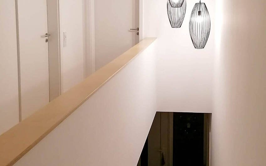  Designerlampe im Treppenaufgang des Kern-Haus Modus in Halle Giebichenstein