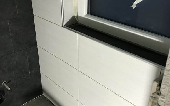 Wandfliesen im Gäste-WC in der Kern-Haus-Stadtvilla Signus in Flörsheim-Dalsheim