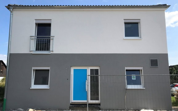 Fassade der individuell geplanten Kern-Haus-Stadtvilla Mateo in Sasbach