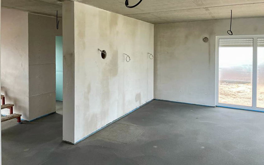 Innenputz und Estrich im Wohnbereich des Kern-Haus Familienhaus in Halle Reideburg