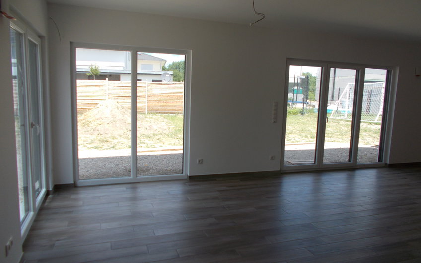 Wohn- und Esszimmer im Familienhaus Luna von Kern-Haus in Dettenheim