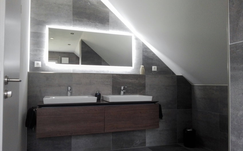 Badezimmer im individuell geplanten Einfamilienhaus Signum von Kern-Haus in Einselthum