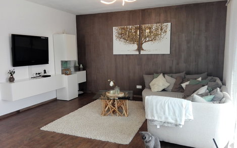 Wohnzimmer im individuell geplanten Einfamilienhaus Signum von Kern-Haus in Einselthum