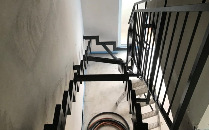 Treppe in der individuell geplanten Kern-Haus-Stadtvilla Mateo in Sasbach