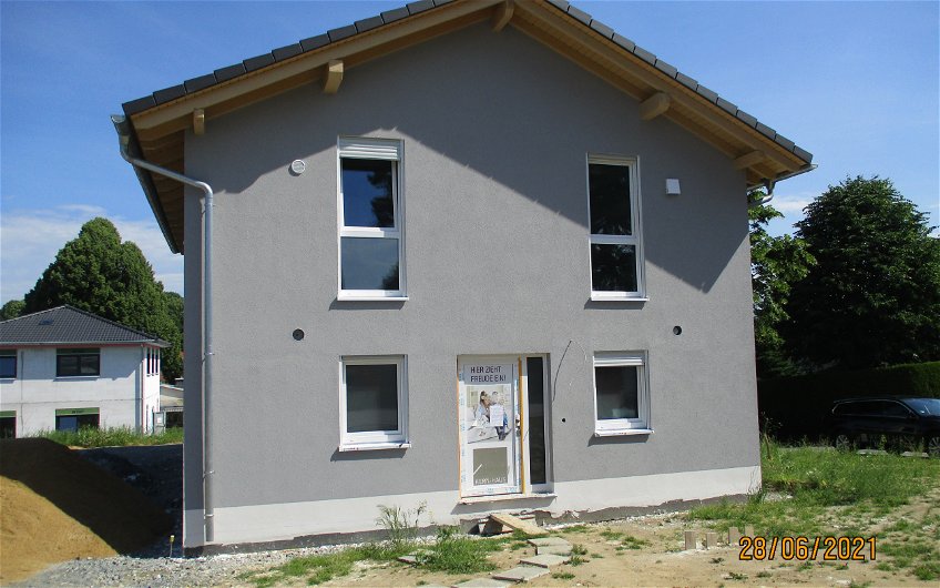 Fertigstellung des Außenputzes für Kern-Haus Jara in Amtsberg, OT Schlösschen