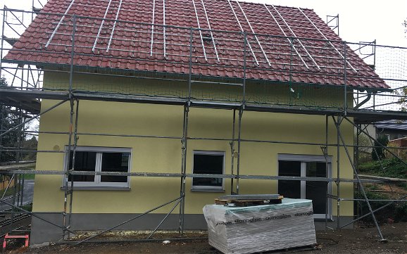 Putz und Dacheindeckung nach Wunsch der Bauherren
