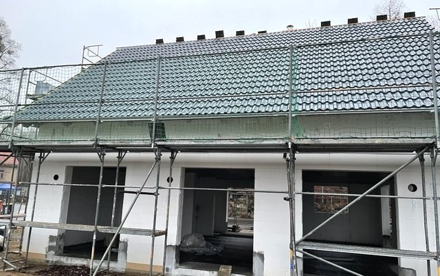 Dach und Fensteranlieferung