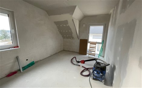 Trockenbau Verputzung der Wände Zimmer DG
