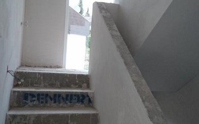 Treppenaufgang im frei geplanten Einfamilienhaus von Kern-Haus in Gaggenau-Ottenau