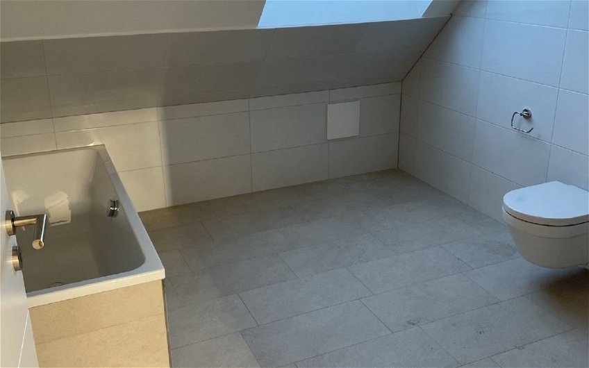 Badezimmer in den frei geplanten Mehrfamilienhäusern von Kern-Haus in Hemsbach