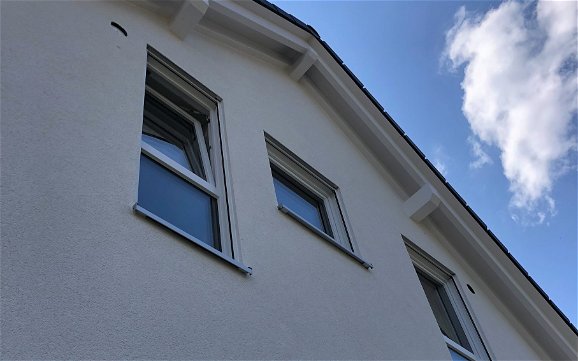 Fassade des individuell geplanten Familienhauses Jara von Kern-Haus in Ammerbuch