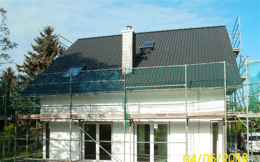 Dacheindeckung und Fenstereinbau bei Kern-Haus Rohbau in Machern