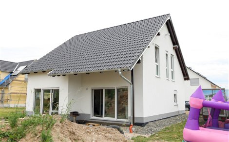Familienhaus Rohbau mit überdachter Terrasse