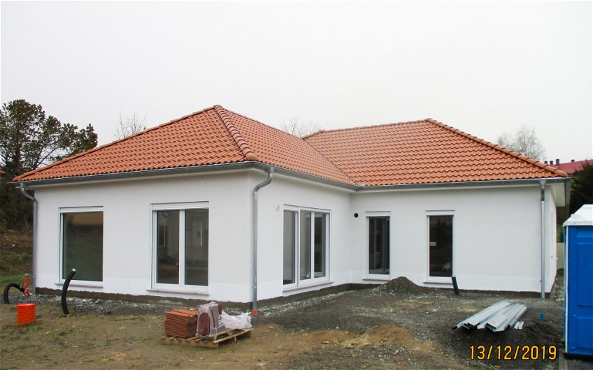 Fertigstellung des Außenputz für Kern-Haus Bungalow in Leipzig