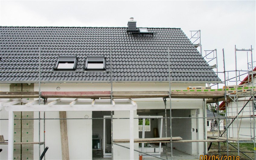 Dacheindeckung Fenstereinbau und Terassenüberdachung für Kern-Haus Doppelhaushälfte in Leipzig Lindenthal