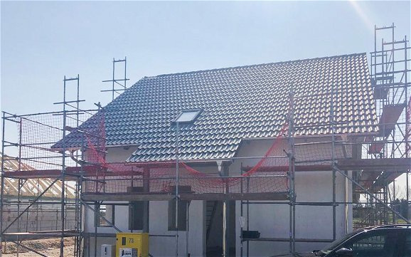 Dacheindeckung und Dachabschleppung des Kern-Haus in Leipzig