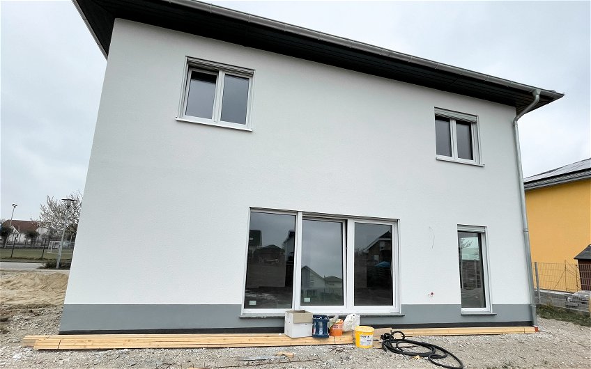 Kern-Haus Leipzig individuell geplantes Architektenhaus mit Wärmepumpe energieeffizientes Eigenheim in Massivbauweise regional Qualität gute Erfahrungen Garantien Terrasse