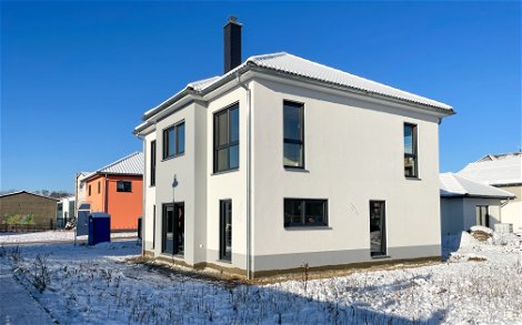 Kern-Haus Leipzig Massivhaus Architektenhaus energieeffizient Kamin modern bauen