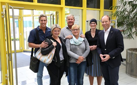 Gruppenfoto mit Norman Langen, seiner Familie und dem Kern-Haus Rhein-Ruhr Geschäftsführer Axel Kaltenbach und seiner Frau.