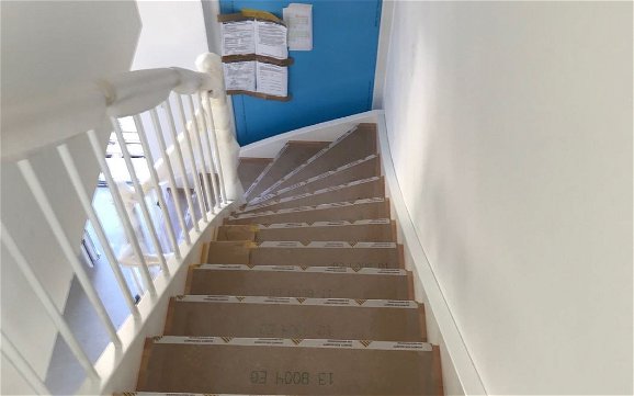 Treppe im individuell geplanten Familienhaus Komfort von Kern-Haus in Konstanz-Litzelstetten