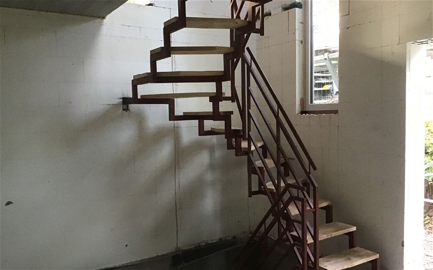 Treppe im frei geplanten Familienhaus von Kern-Haus in Korb