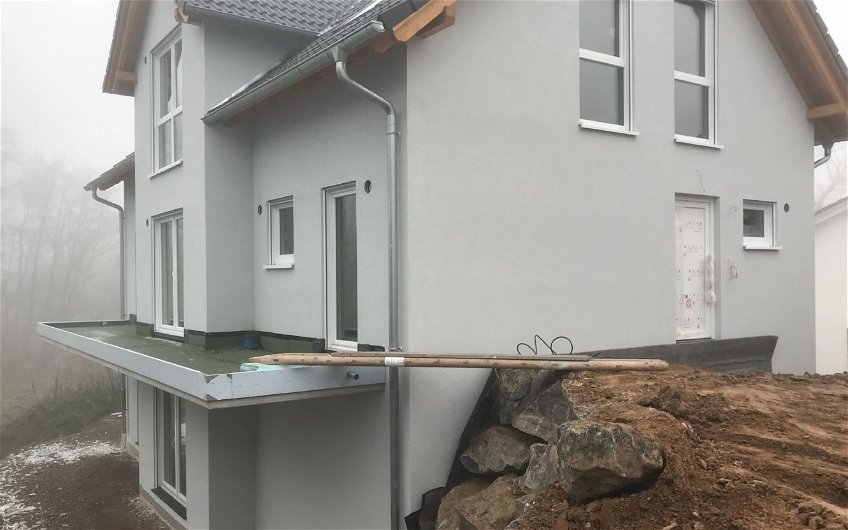 Individuell geplantes Familienhaus Aura mit Einliegerwohnung von Kern-Haus in Ühlingen-Birkendorf