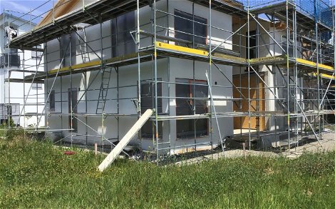 Außenputz am individuell geplanten Familienhaus Luce von Kern-Haus in Sindelfingen-Darmsheim