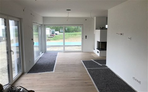 Wohn- und Esszimmer im frei geplanten Familienhaus von Kern-Haus in Baindt